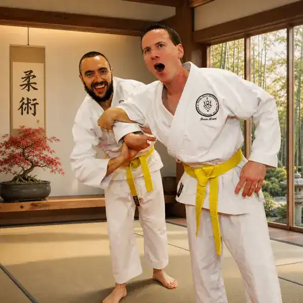 Beginner Ju-Jitsu partners training in yellow belts