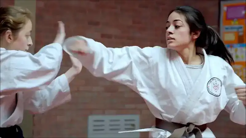 Two women discussing their experience of training in Ju-Jitsu